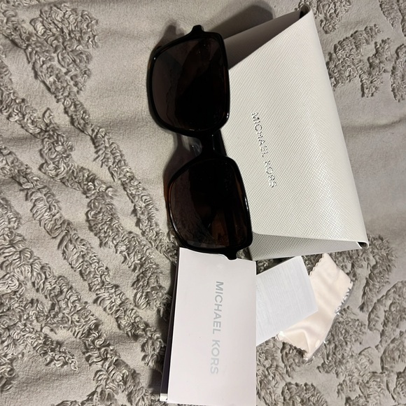 Michael kors sunglasses. Never worn brand new with case and...